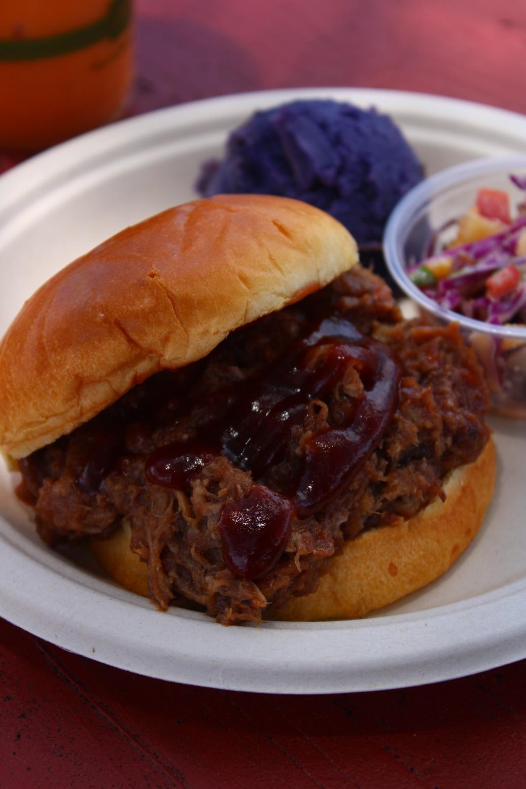 Pulled pork sandwich with purple sweet potato and slaw from Ke Aloha Wagon