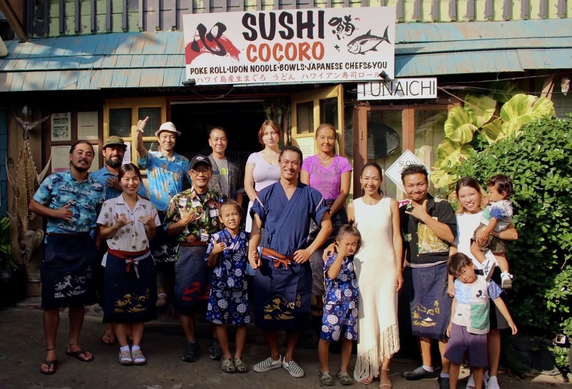 The Sushi Cocoro team and their families in front of the restaurant