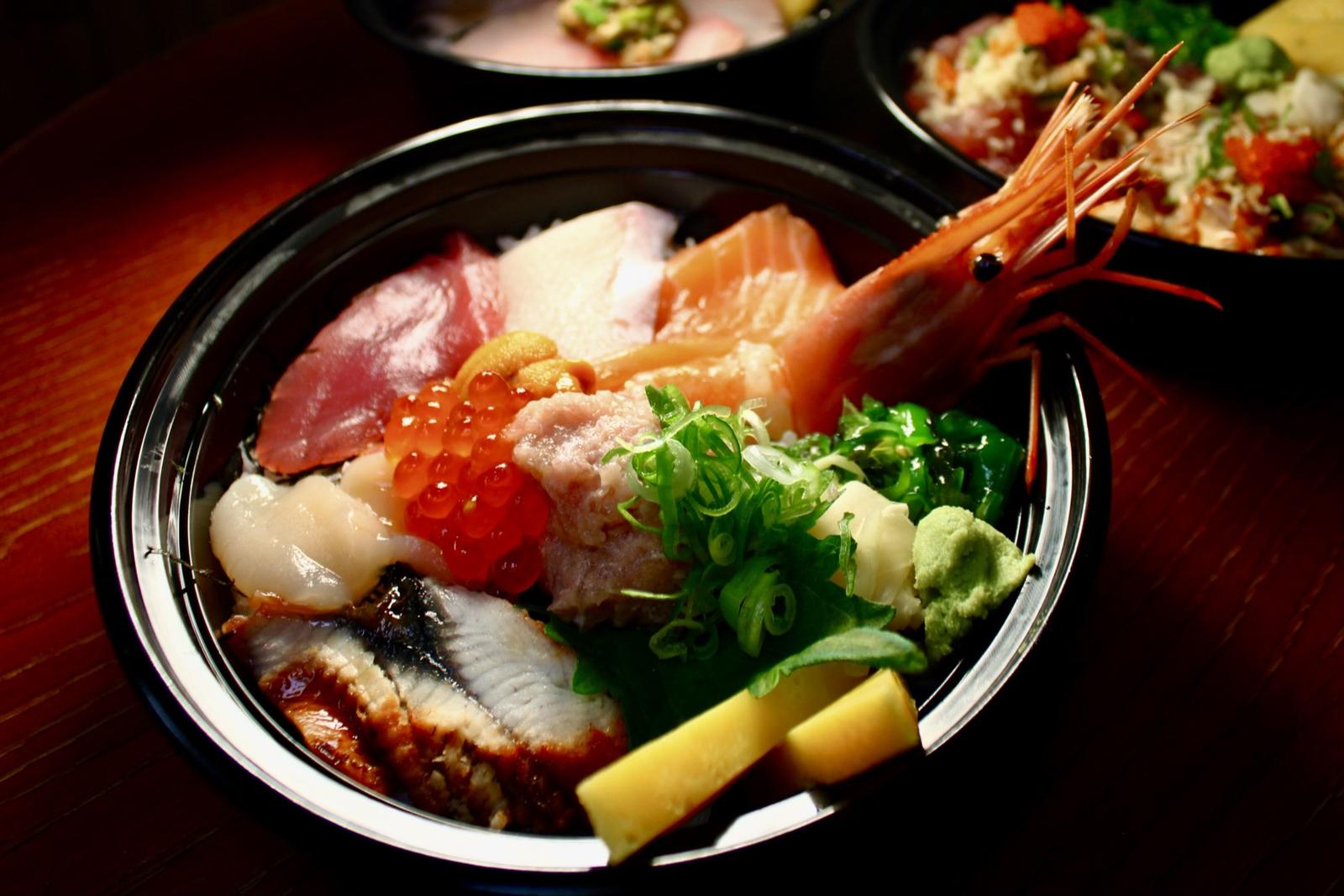 Chirashi bowl with sashimi, ikura and a whole shrimp at Sushi Ku'u